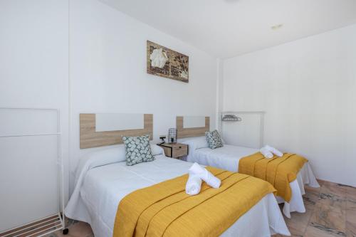 Ένα ή περισσότερα κρεβάτια σε δωμάτιο στο Villa cacin