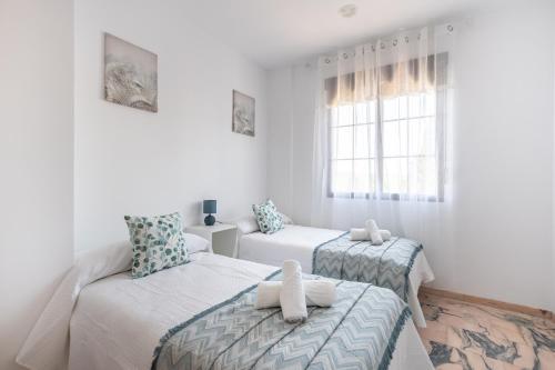 Ένα ή περισσότερα κρεβάτια σε δωμάτιο στο Villa cacin