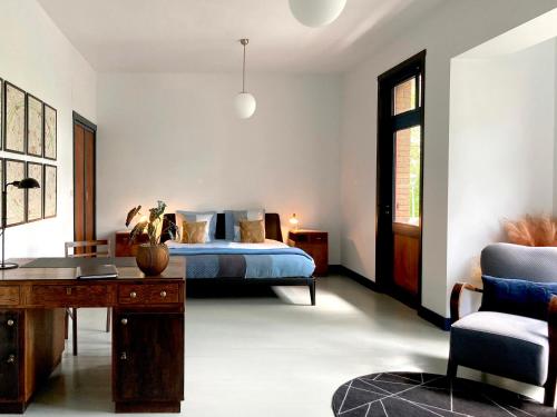 Postel nebo postele na pokoji v ubytování B&B Huis Billiet