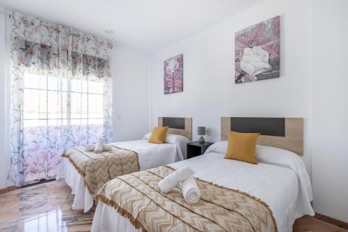 Ένα ή περισσότερα κρεβάτια σε δωμάτιο στο Villa cacin