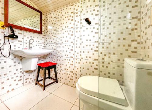 Ванная комната в Chacara com conforto e lazer em Joanopolis SP