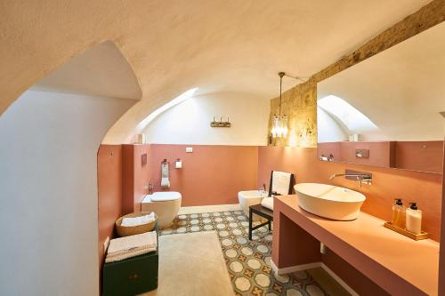Un baño de Fra I Sassi Residence