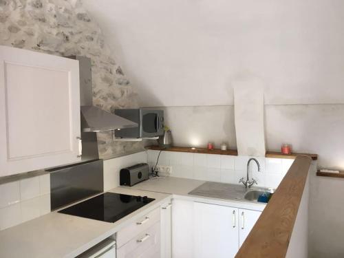 Η κουζίνα ή μικρή κουζίνα στο Les Espaces Bergerie - La Hazira