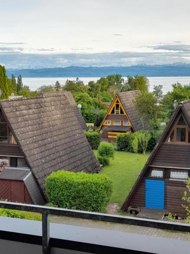 a view from the balcony of a house at Lakeview by Bea in Immenstaad am Bodensee