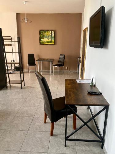 TV a/nebo společenská místnost v ubytování Apartament For You Roztocze
