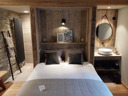 Postel nebo postele na pokoji v ubytování B&B En face du Marronnier