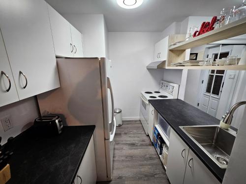 Una cocina o cocineta en Le 4 Saisons 4