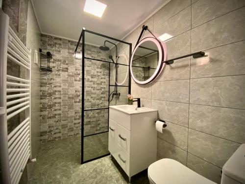 Et badeværelse på AMIS Apartment