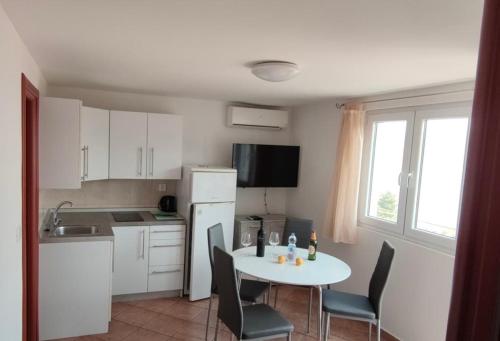 Køkken eller tekøkken på Apartmani Kalff