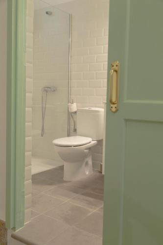 a bathroom with a toilet and a shower at Casa Cirila in Santa Cruz de la Palma