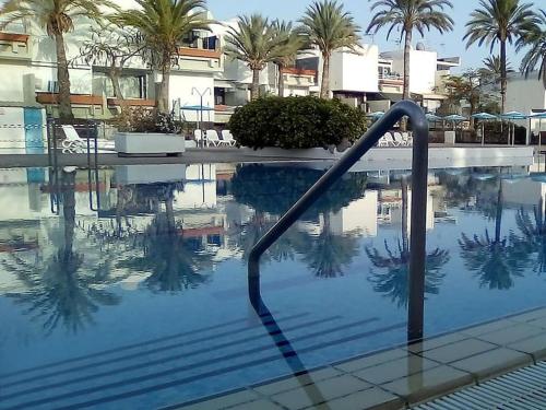 Bazén v ubytování Morada Sunset, piscina y vistas a la bahía Air Cond nebo v jeho okolí