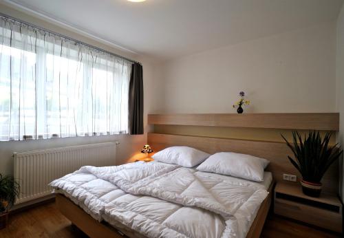 En eller flere senge i et værelse på Appartements Lobkowicz