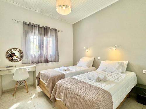 Postel nebo postele na pokoji v ubytování Villa Doramarie Sidari with private pool by DadoVillas