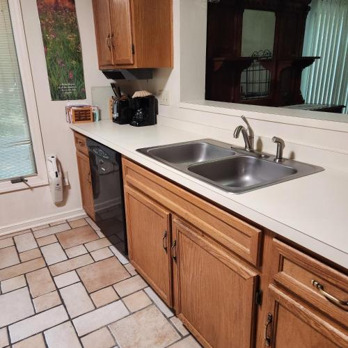 a kitchen with a sink and a dishwasher at Massanutten Resort Home - Quiet, Convenient, Family- and Pet-Friendly in Massanutten