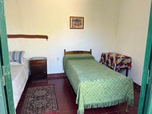 מיטה או מיטות בחדר ב-Villa Nanin