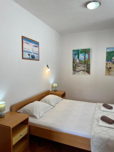 Apartments by the sea Zuljana, Peljesac - 4577にあるベッド