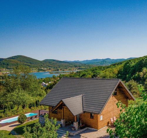 an overhead view of a house with a roof at Family friendly house with a swimming pool Ogulin, Gorski kotar - 22843 in Ogulin