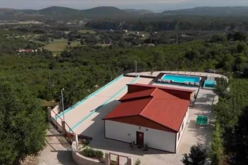 an overhead view of a swimming pool at Family friendly house with a swimming pool Donji Dolac, Zagora - 21274 in Dugopolje