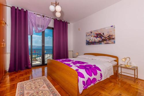 Apartments with parking space Novi Vinodolski - 22846