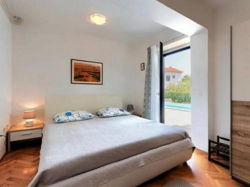 Holiday house with a swimming pool Porec - 23000