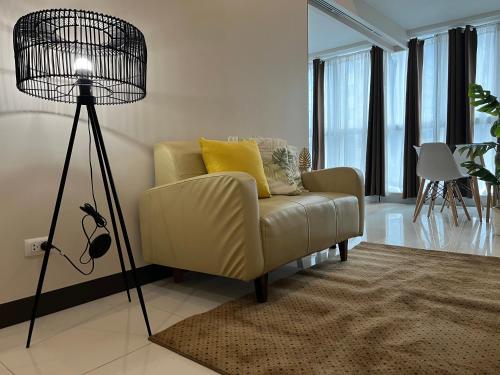 A seating area at Great Value in Uptown Parksuites BGC 1BR,Washer,Netflix