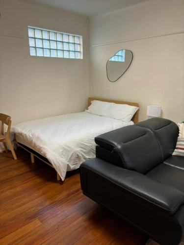 Säng eller sängar i ett rum på Regents Gate