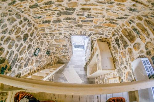 an overhead view of a building with a stone wall at Byzantine Home in the Castle in Mesta