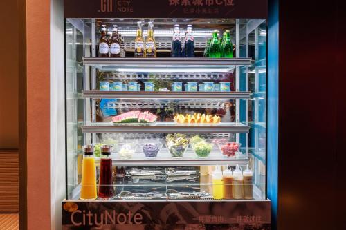 a refrigerator filled with lots of food and drinks at CityNote Hotel - Guangzhou Donghu Metro Station Pearl River Night Tour Dashatou Pier Shop in Guangzhou