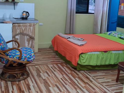 Cama o camas de una habitación en Mí Oficina