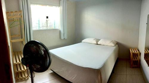 Ein Bett oder Betten in einem Zimmer der Unterkunft Recanto da Chapada