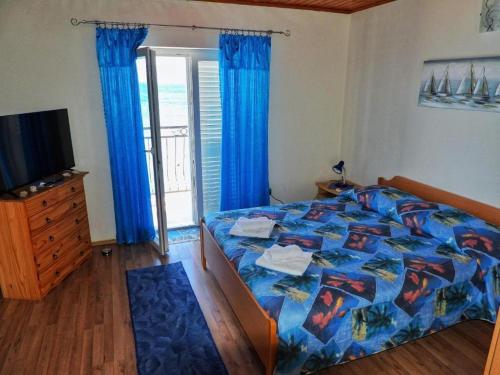 Postel nebo postele na pokoji v ubytování Apartment Zdravko - 5 m from beach