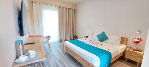 Cama ou camas em um quarto em OSEIDON HOTEL BORACAY