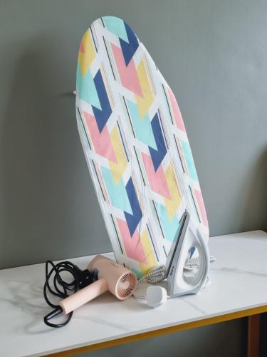 a lamp sitting on top of a table at Simple Nice Stay @ Riverine Diamond Petanak in Kuching