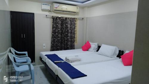 Katil atau katil-katil dalam bilik di Gemini Guest House