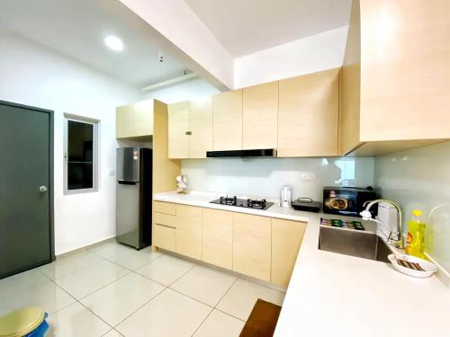 Kuchyň nebo kuchyňský kout v ubytování Metropol Penang