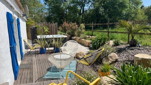 Vonkajšia záhrada v ubytovaní Gîtes de charme "l'écrin de Vendée" jacuzzi privatif, piscine chauffée, prestations bien être, vélos, chevaux,à 10 mn de l'océan