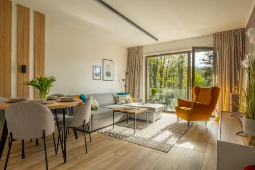 Et opholdsområde på Apartament IGA z basenem i saunami KARKONOCE Stone Hill - centrum