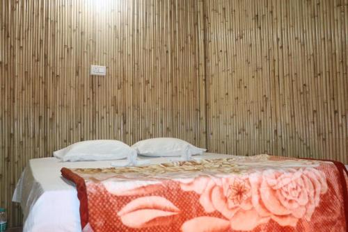 מיטה או מיטות בחדר ב-Basera Home stay