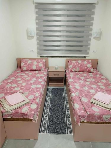 Cama o camas de una habitación en Apartmani Manić