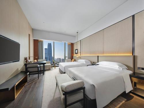 InterContinental Dongguan by IHGにあるベッド