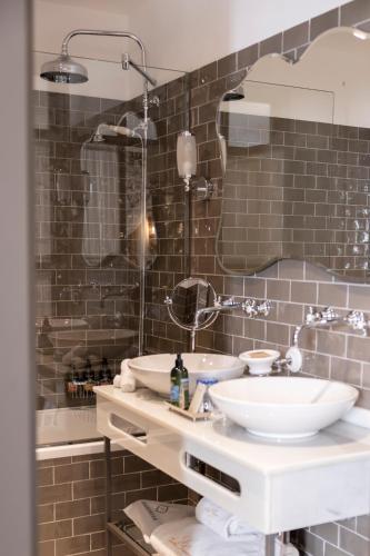 Koupelna v ubytování Hotel Gravina 51