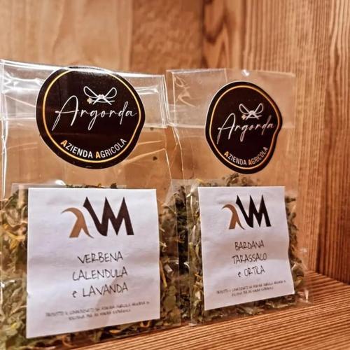 a group of three bags of organic coffee beans at Ad Maiora Baita Walser with SPA in Alagna Valsesia