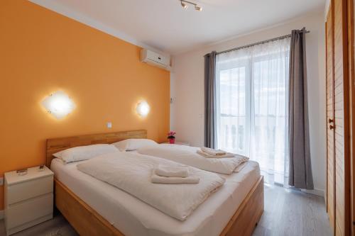 Posteľ alebo postele v izbe v ubytovaní Guesthouse Halilagic