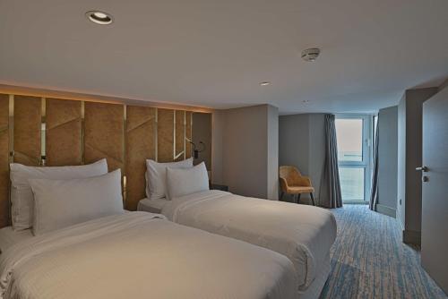 Best Western Premier Ottoperla Hotelにあるベッド