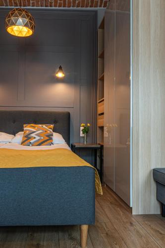 Una cama o camas en una habitación de STAYPOLSKA