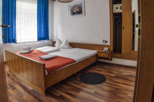 מיטה או מיטות בחדר ב-Hotel Fraganterwirt