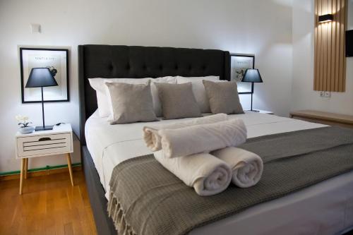 Ένα ή περισσότερα κρεβάτια σε δωμάτιο στο Casa Reale Ioannina