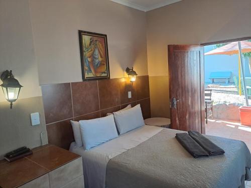 Postel nebo postele na pokoji v ubytování Sleep 'n Go Guesthouse