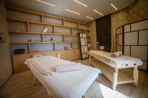 Postel nebo postele na pokoji v ubytování Hotel Imperial Conference & Spa