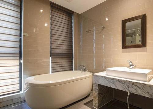 Ett badrum på 3S Hotel Sorae